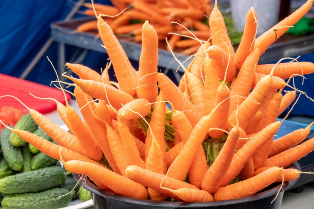 Leafy green vegetables and carrots high in lutein and beta-carotene for eye protection