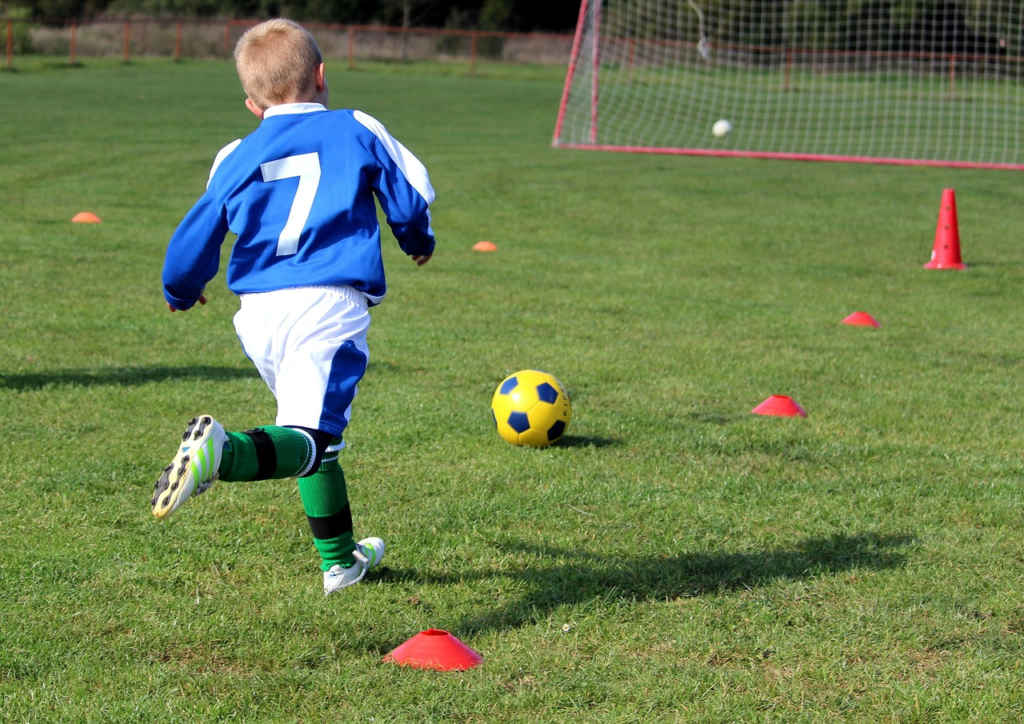 Child enjoying outdoor play in natural light — an effective way to prevent myopia