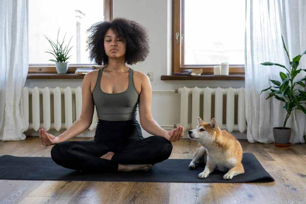 Relaxed person meditating to reduce stress and improve vision-brain connection.