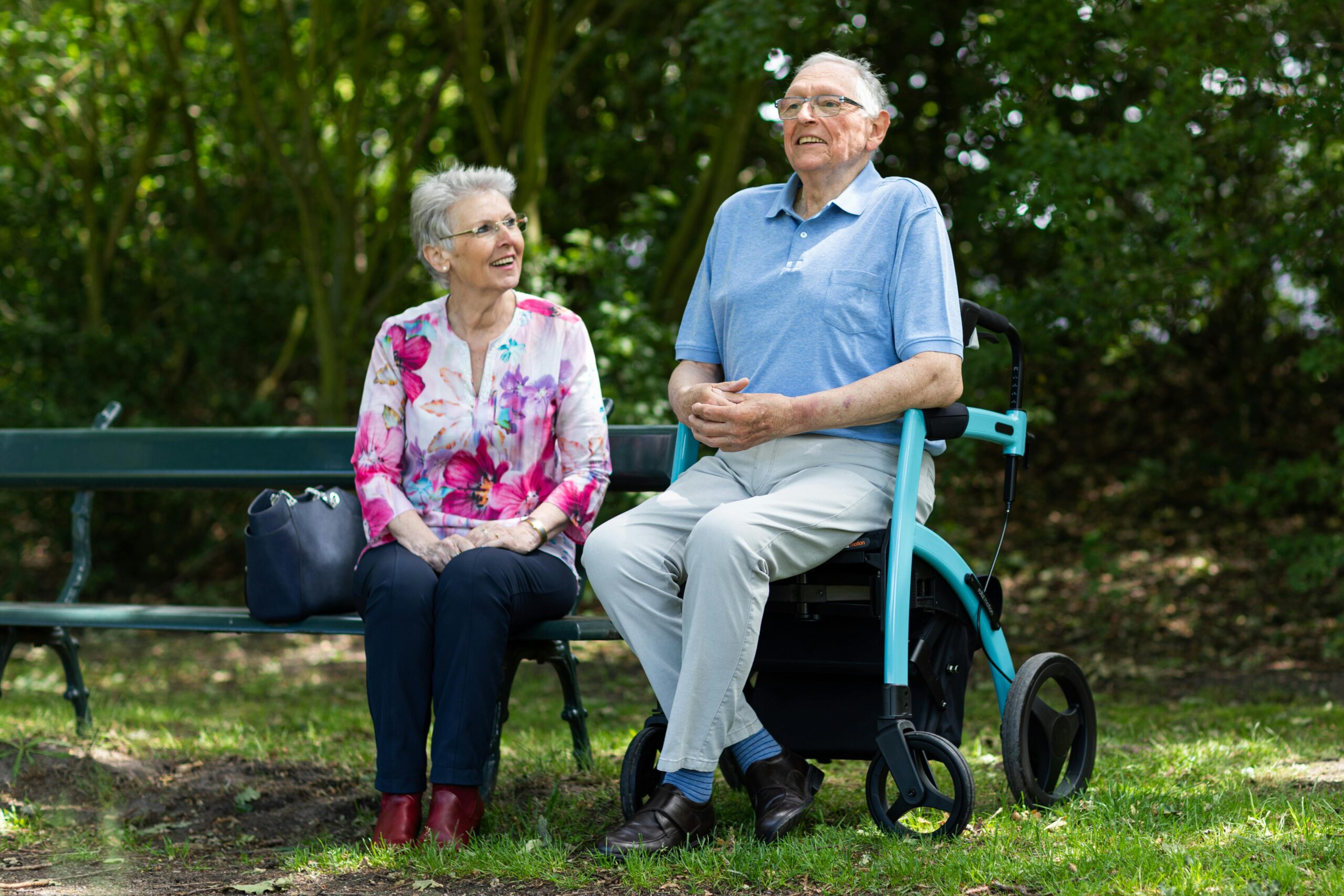 Senior couple outdoors with healthy eyesight, symbolizing lifelong vision care