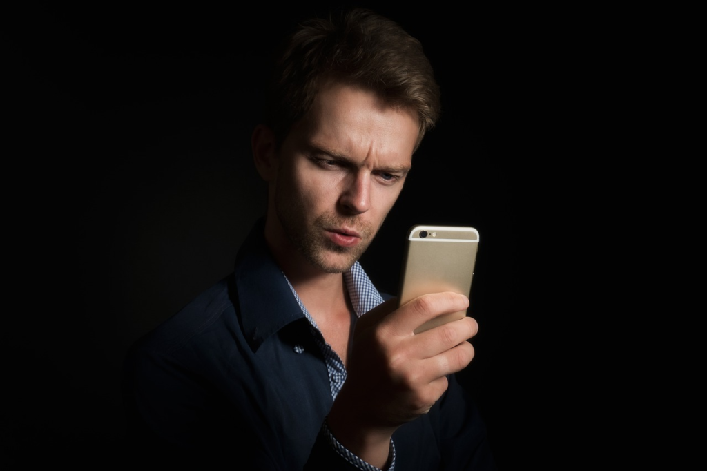 Person using a vision tracking app on a smartphone, showing AI-based diagnostic interface