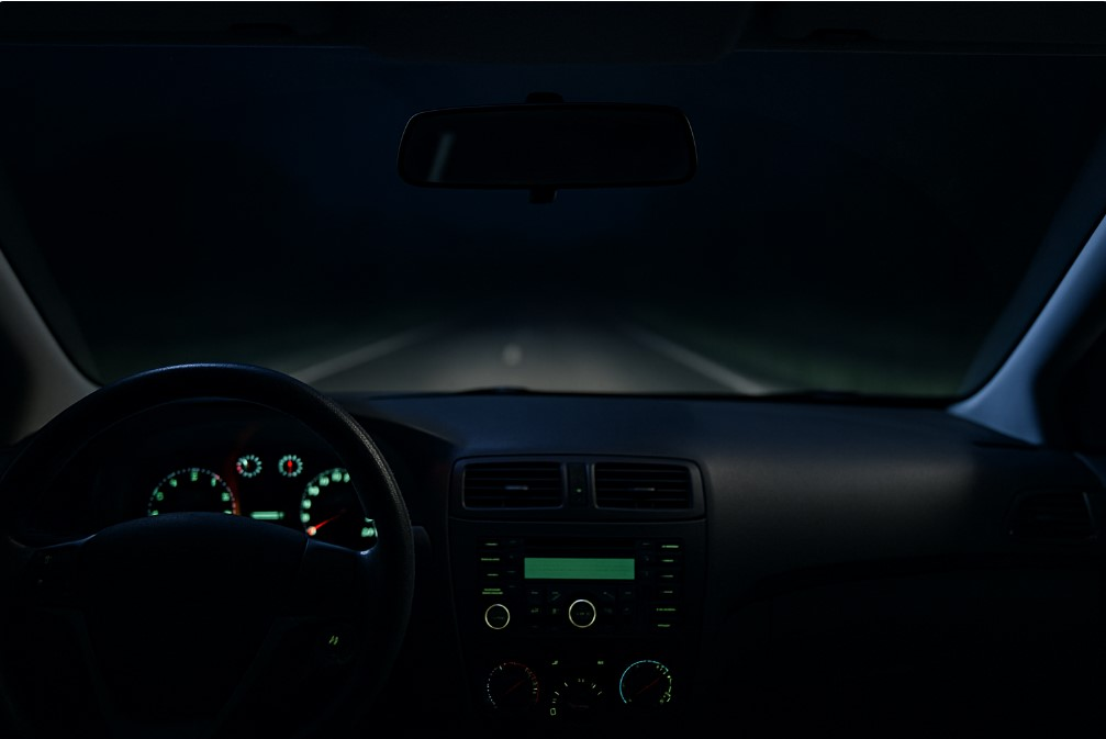 Car interior optimized for night driving with reduced glare and clean windshield