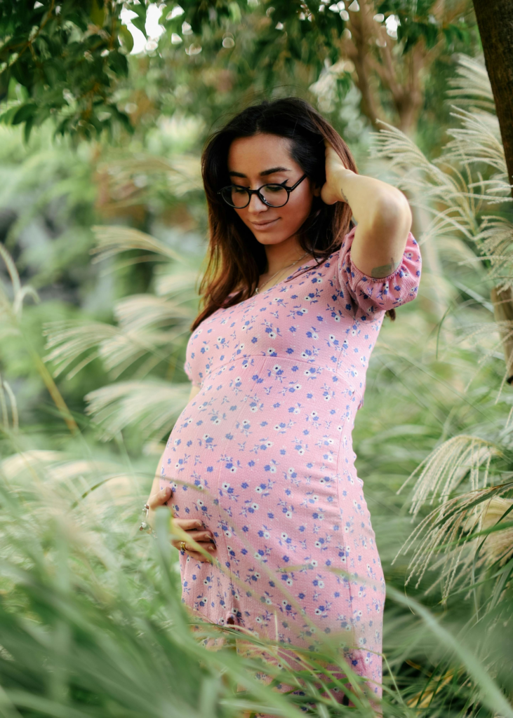 Pregnant woman experiencing temporary vision changes due to hormonal changes and vision fluctuations during pregnancy.