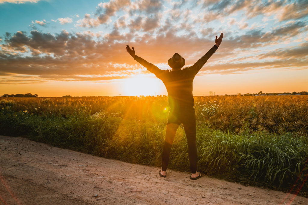 Person outdoors getting morning light to support eye health