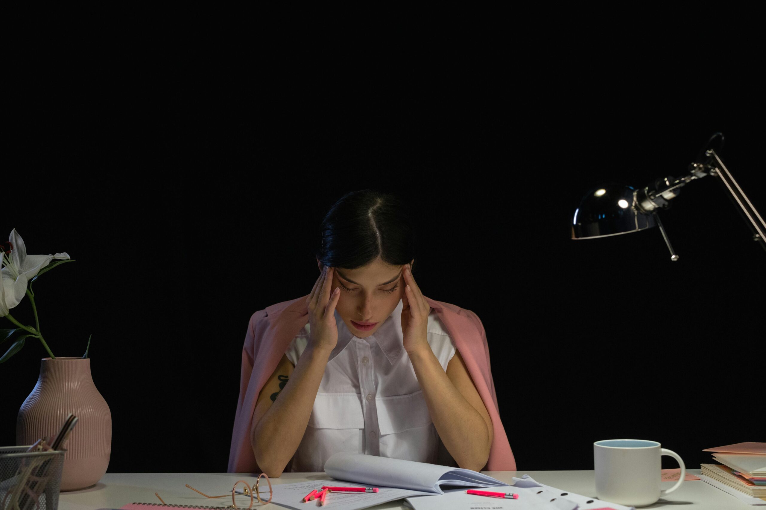 Person suffering from heavy and tired eyes due to digital eye strain.