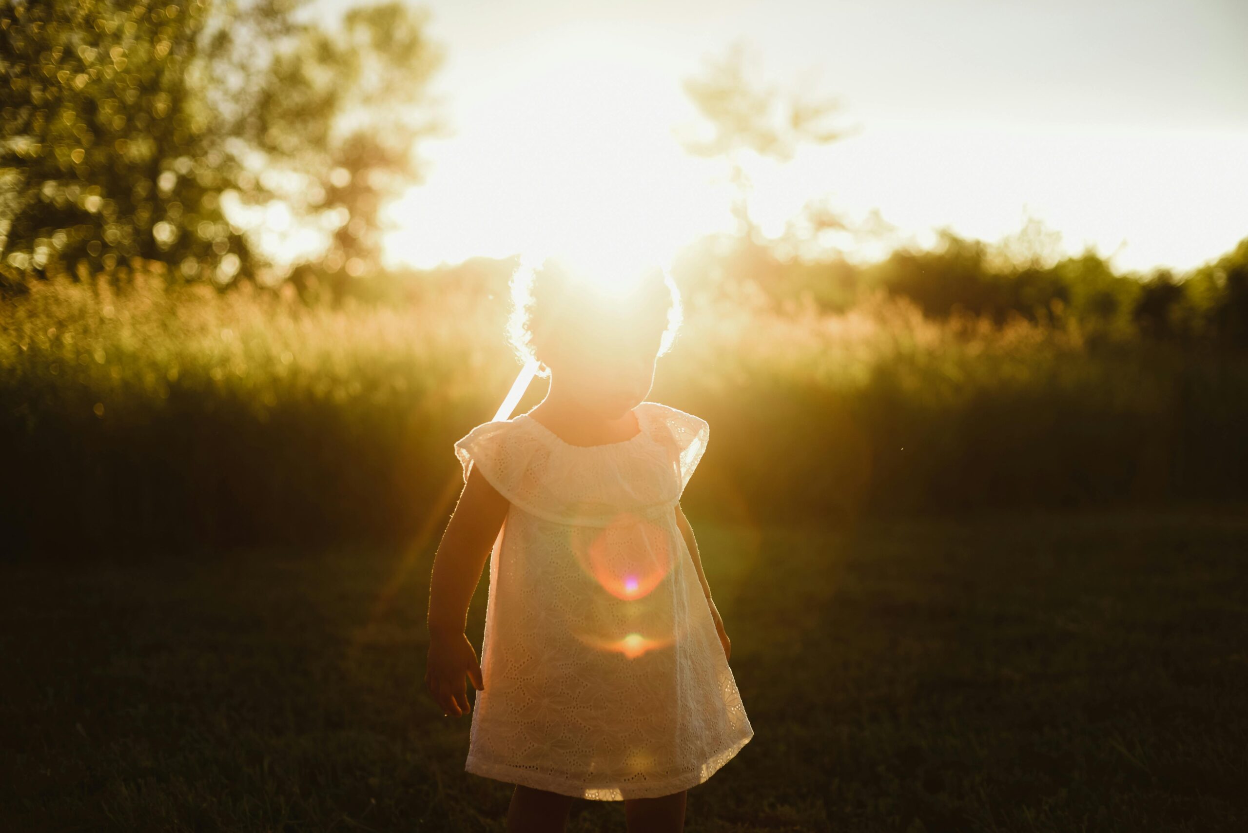 Outdoor Light Eye Health starts with sunlight: A person standing in bright natural light, representing the beneficial Dopamine release for vision.