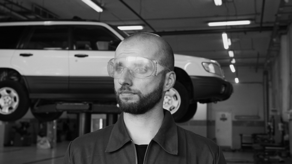 Industrial worker wearing glasses for workplace eye safety.
