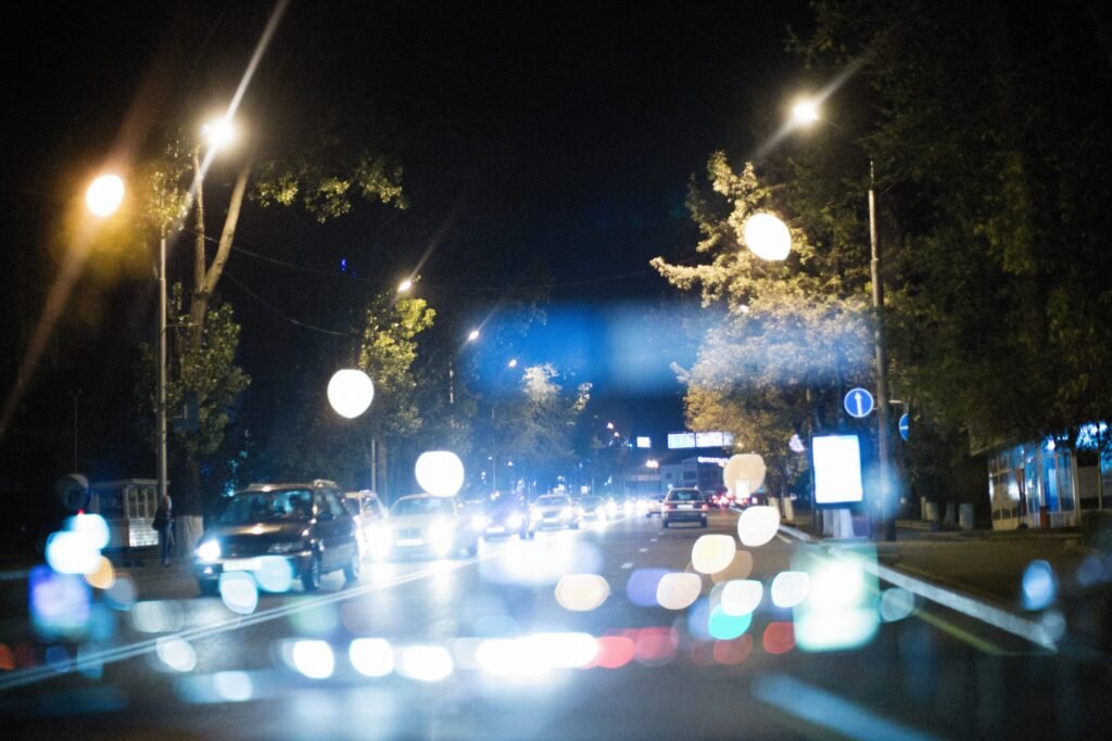 Night time driving eye strain caused by oncoming headlight glare and visual halos.