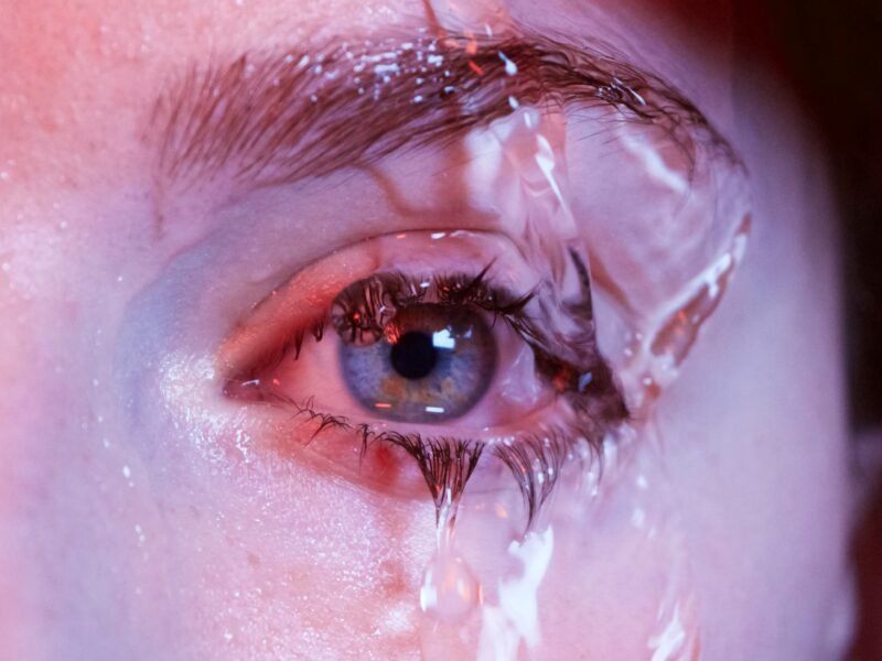Eyes watering but feel dry in a close-up of a watery eye