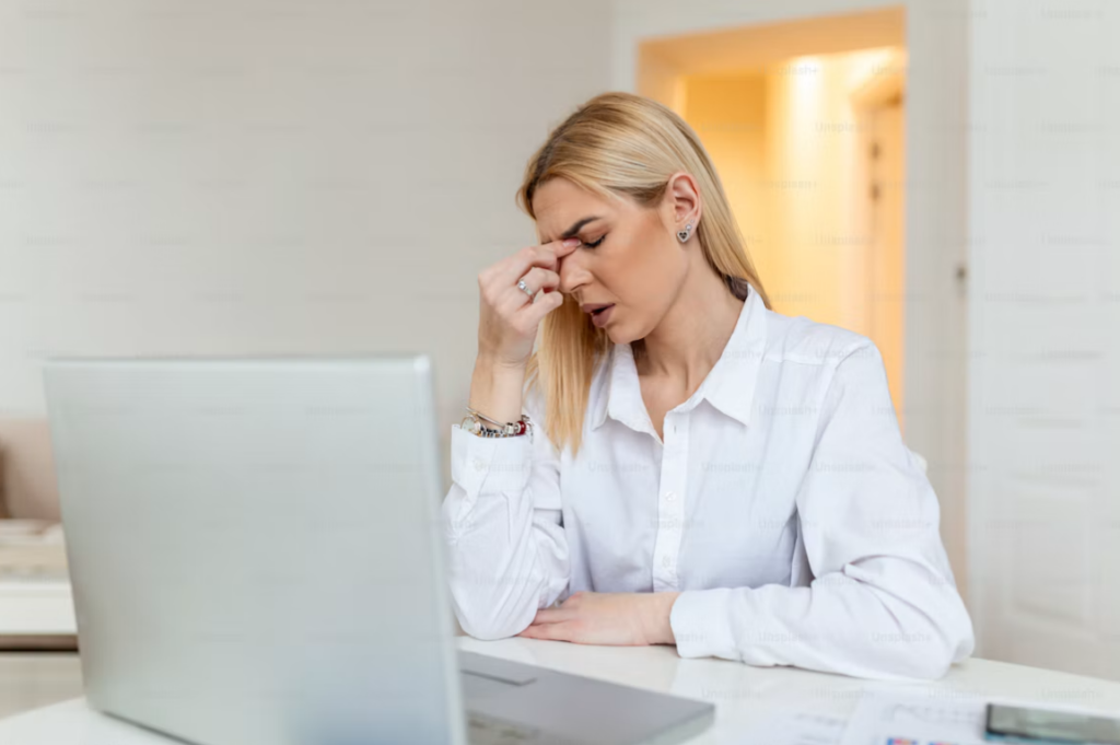 woman computer tired eyes natural