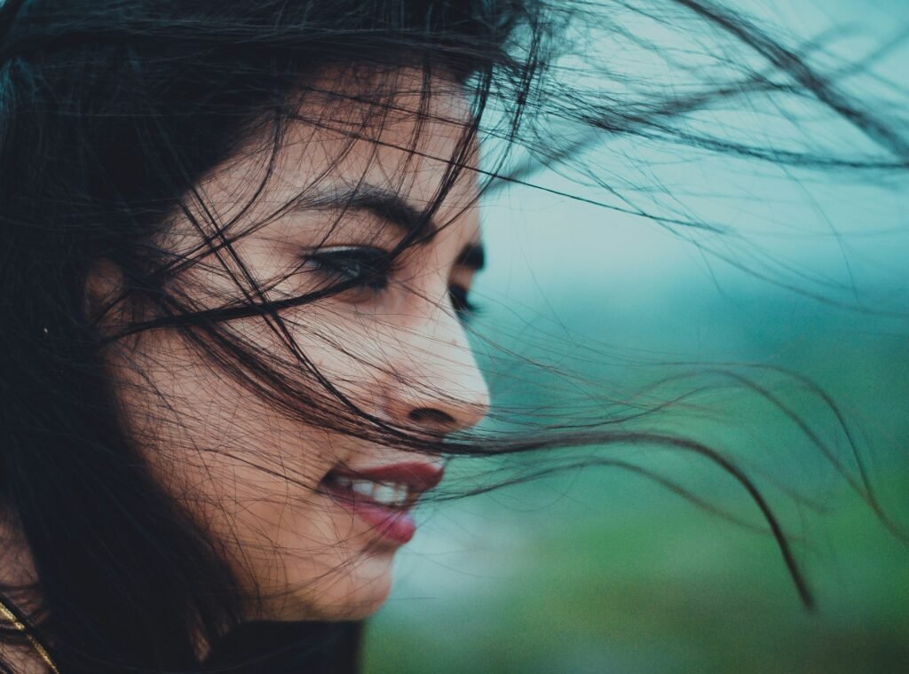 woman windy weather face natural